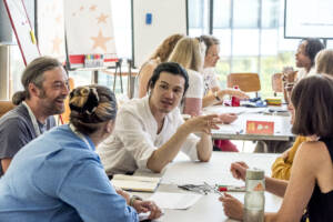 A small group conversation during a workshop at ID Screening Days