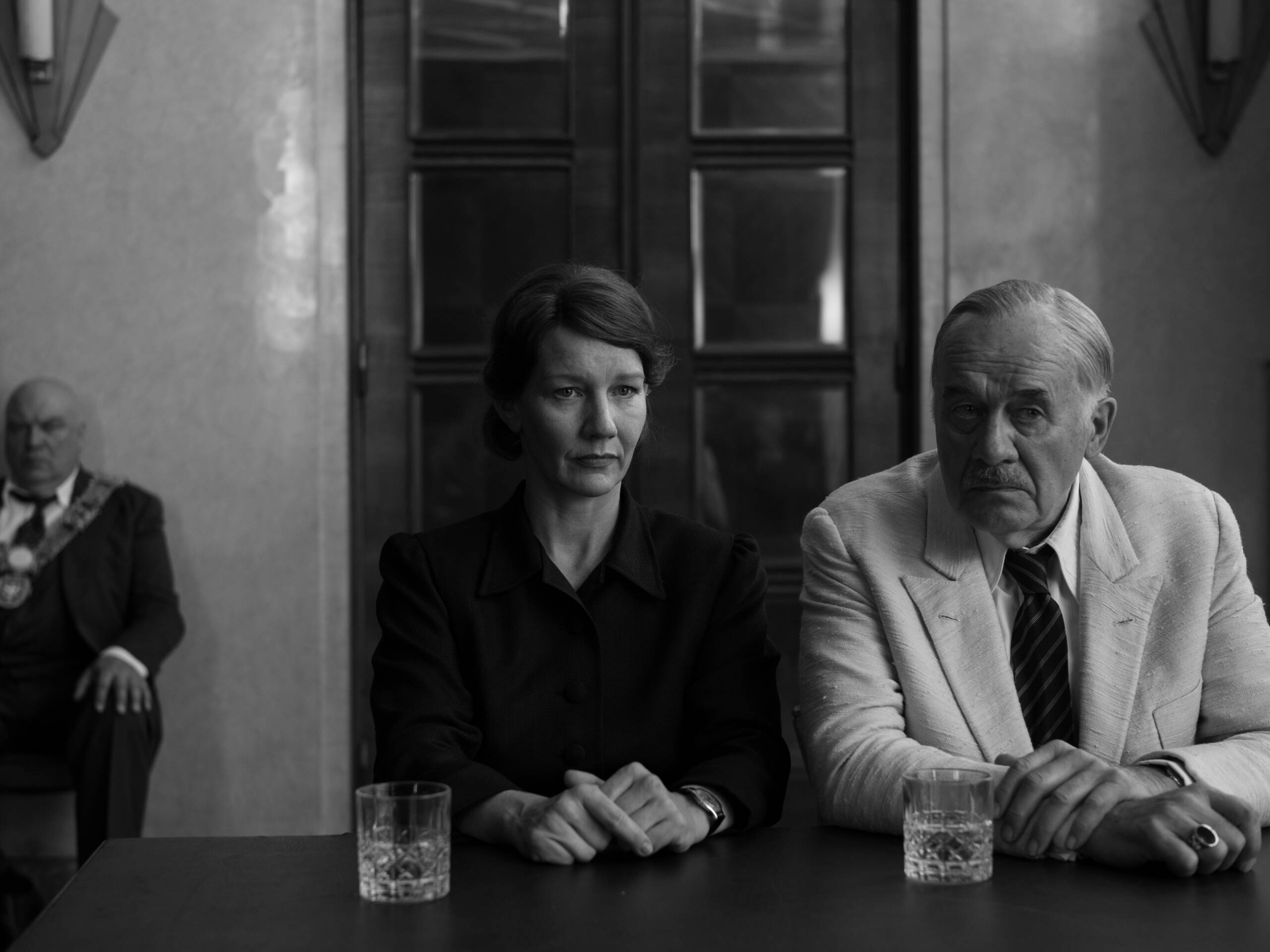 Cannes Ones to Watch: Fatherland

Still shows two people sat at a table with glasses of water in front of them